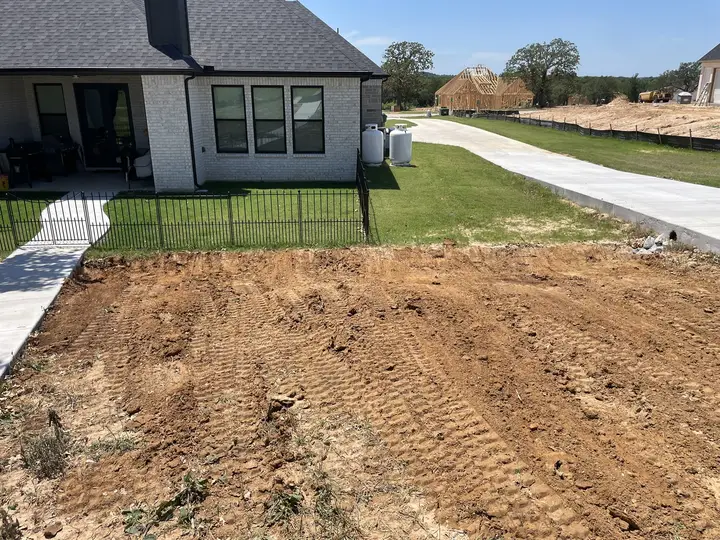Finish grade next to new build