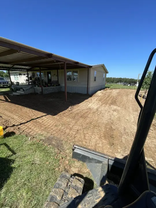 Rough grade around structure